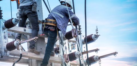 electricians-are-climbing-electric-poles-install-repair-power-lines electricians-are-climbing-electric-poles-install-repair-power-lines